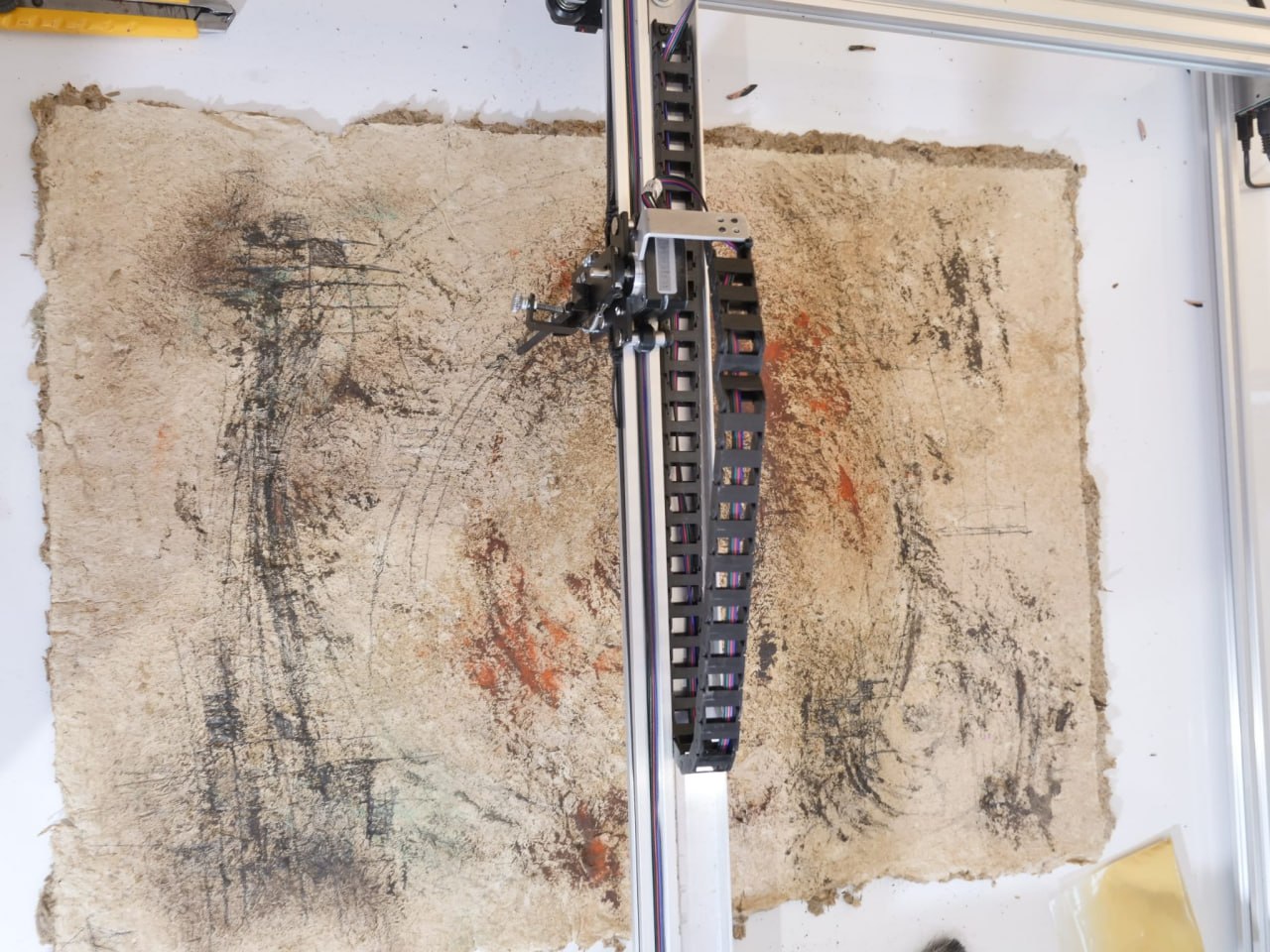 Plotter drawing over handmade Dara paper